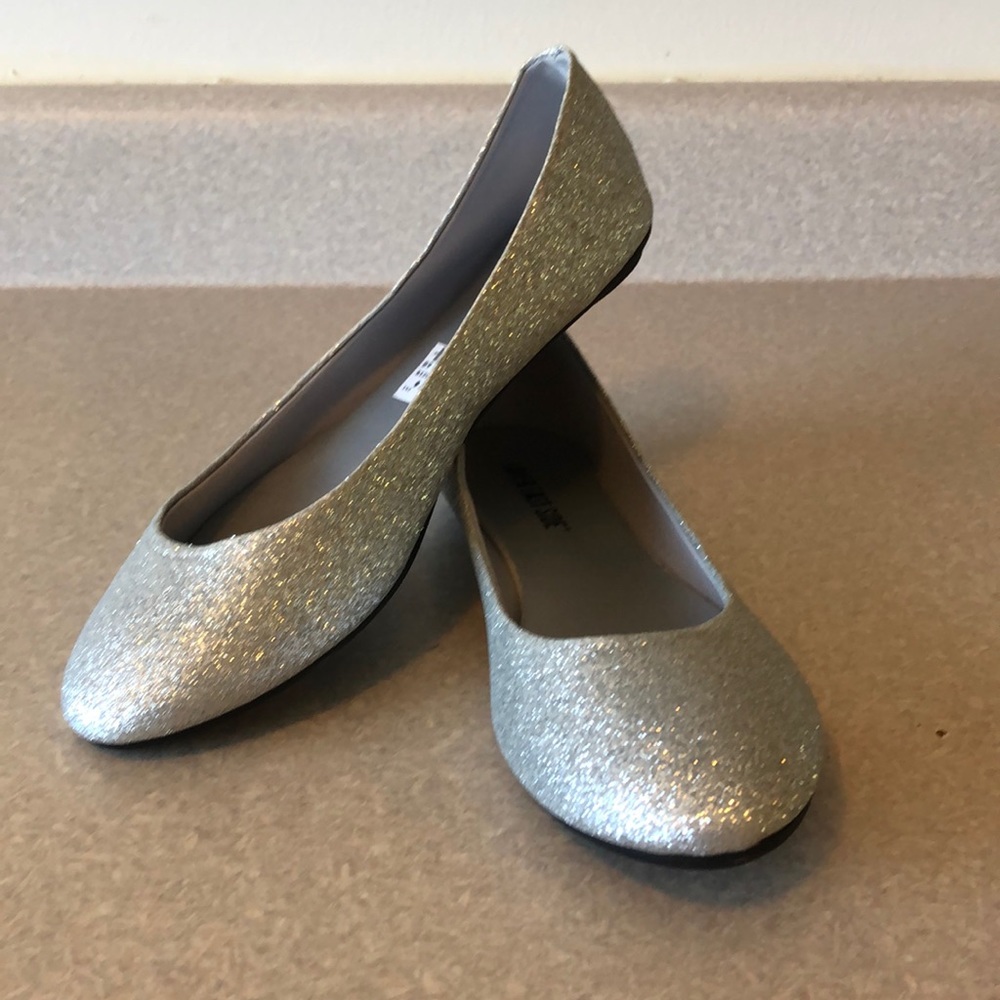 Never worn silver sparkly flats
